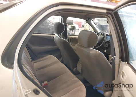 2001 Toyota Corolla Le z USA, uszkodzony, nr VIN 1NXBR12E81Z513824